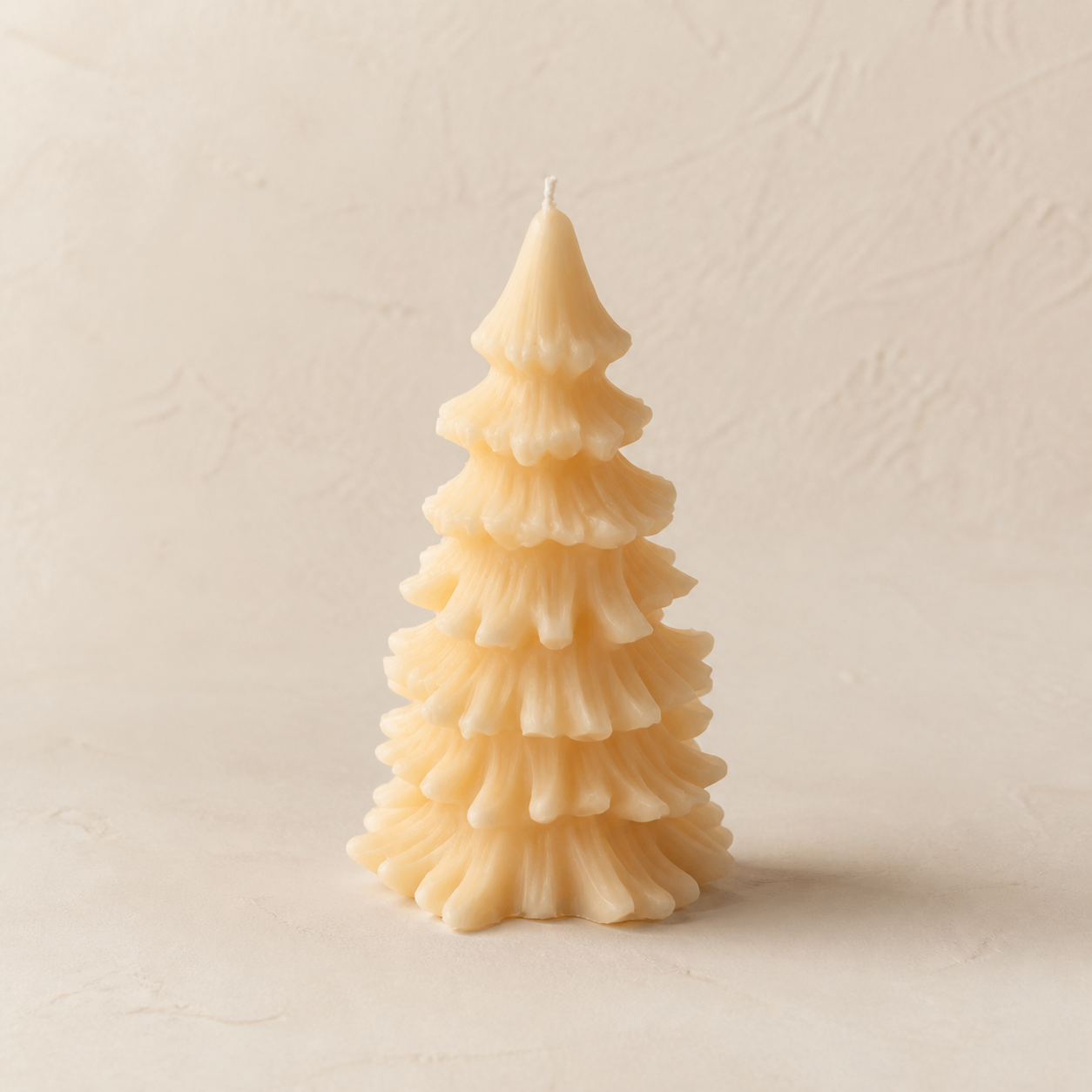 Ivory ruffled holiday tree candle
