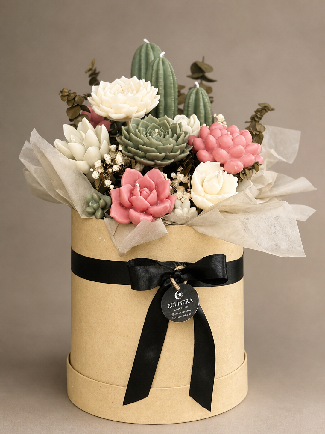 Large cactus and succulent candle garden in a refined vessel