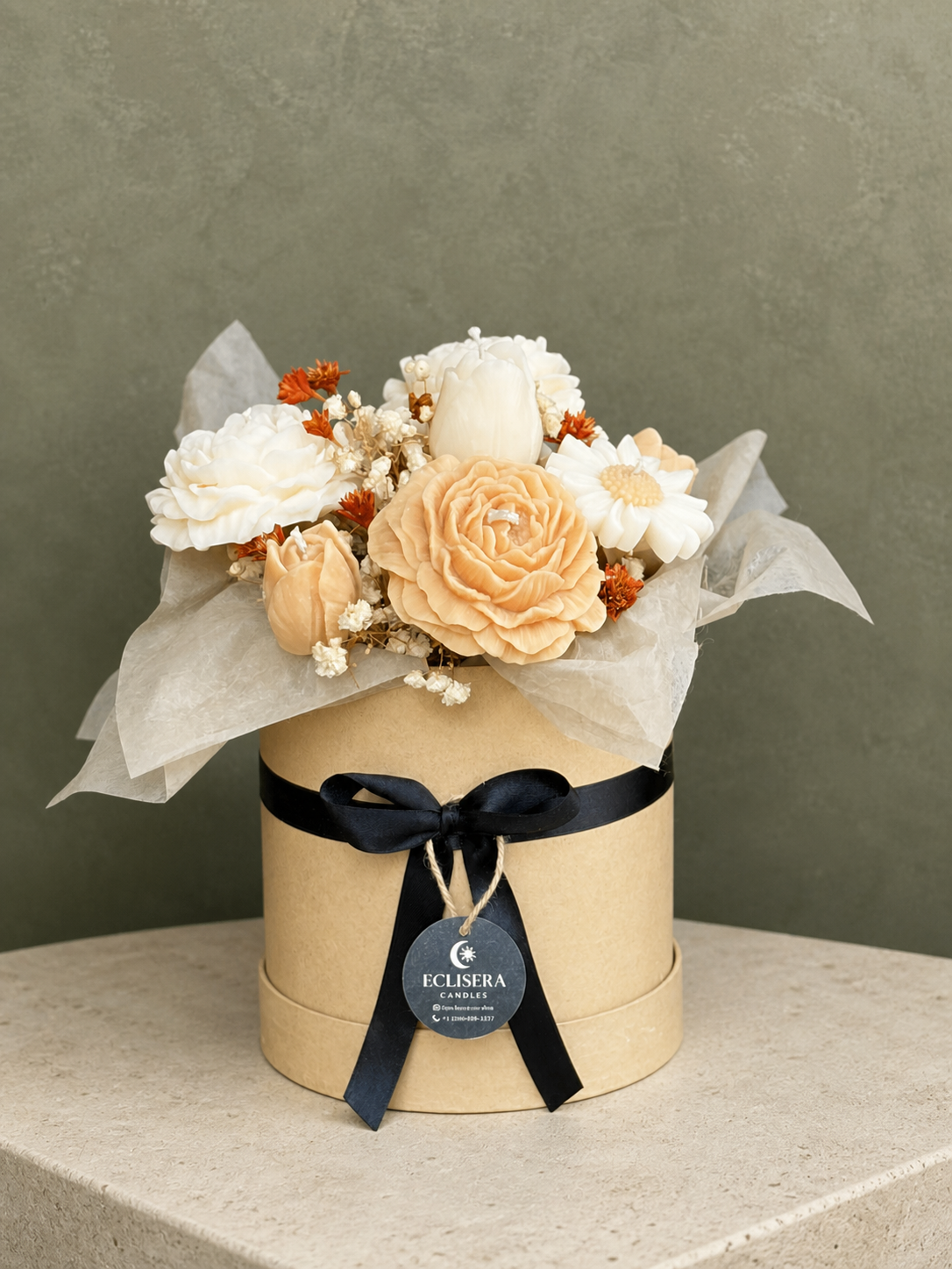 Complete ivory and apricot floral candle bouquet for elevated hospitality gifting